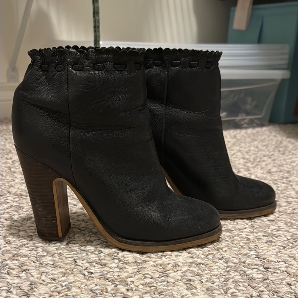 See By Chloe Black Heeled Boots with Ruffled Trim